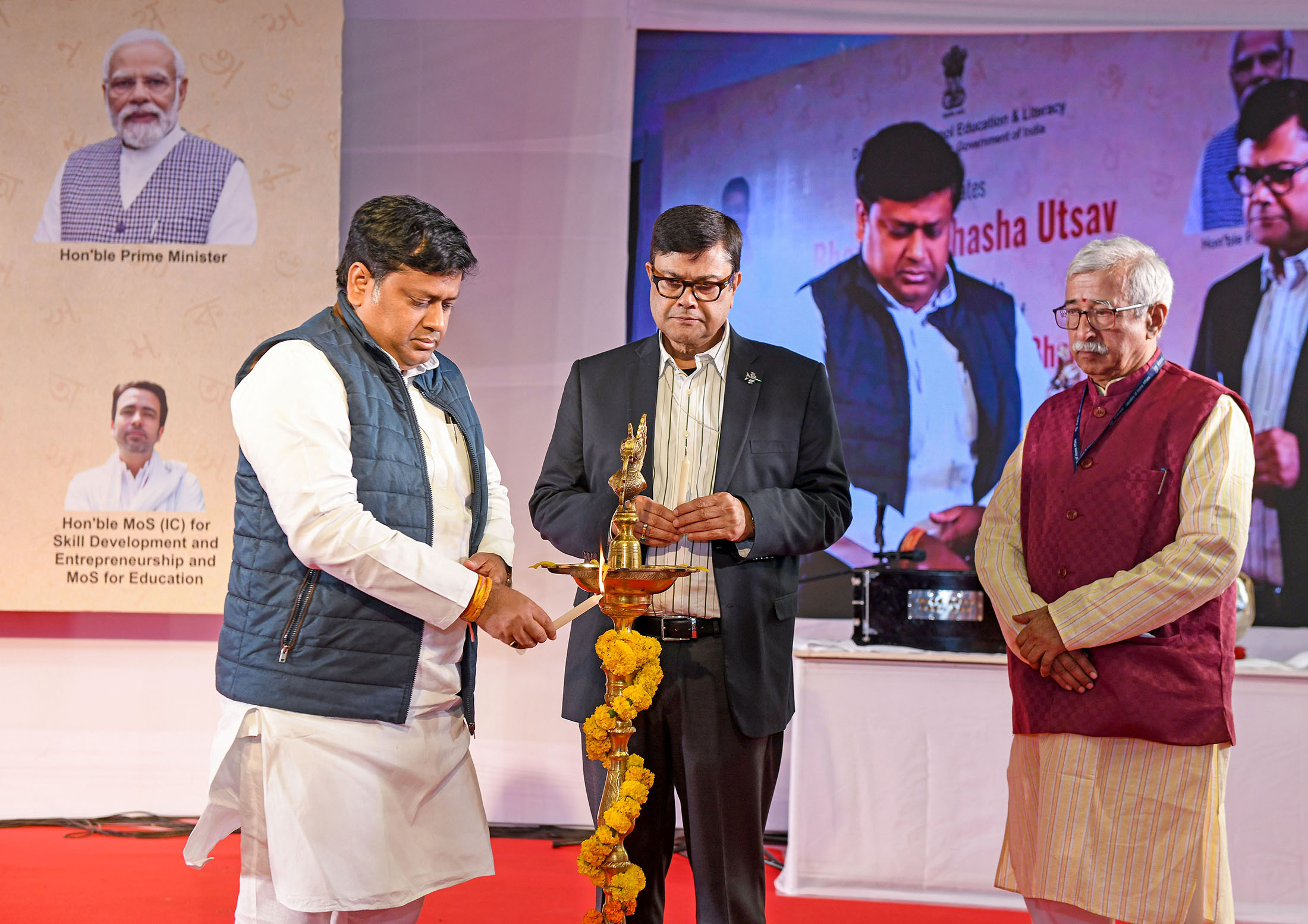 Dr. Sukanta Majumdar lighting the lamp at the Bharatiya Bhasha Utsav celebrations