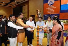 The Union Minister for Education, Skill Development and Entrepreneurship, Shri Dharmendra Pradhan lighting the lamp at the inauguration of the two-day National Conference of School Education Ministers, in Gandhinagar, Gujarat on June 01, 2022