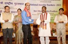 Union Minister for Education Shri Dharmendra Pradhan felicitates the NAT