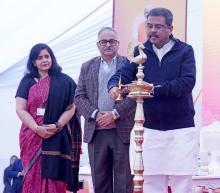 Shri Dharmendra Pradhan lighting the lamp at the launch of various initiatives of NCERT