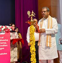 lighting the lamp at the launch of Bharatiya Basha Summer Camp