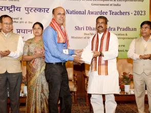 Union Minister for Education Shri Dharmendra Pradhan felicitates the NAT
