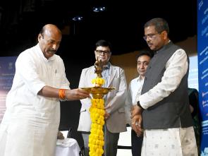 Dr. Virendra Kumar lighting the lamp at the signing of tripartite MoU between DEPwD