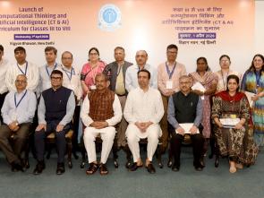 Shri Dharmendra Pradhan in a group photograph during the launch of the AI & Computational Thinking curriculum for Classes III to VIII