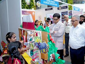 Shri Sanjay Kumar visits an exhibition during the launch of Bharatiya Bhasha Summer Camp 2026