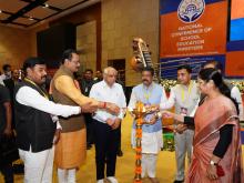 The Union Minister for Education, Skill Development and Entrepreneurship, Shri Dharmendra Pradhan lighting the lamp at the inauguration of the two-day National Conference of School Education Ministers, in Gandhinagar, Gujarat on June 01, 2022