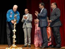 Former NASA astronaut Mr. Mike Massimino lighting the lamp 