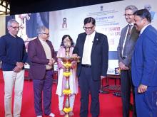Shri Sanjay Kumar lighting the lamp at the Bharatiya Bhasha Utsav 2025