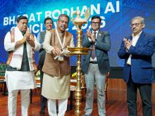 Shri Dharmendra Pradhan lighting the lamp at the ‘Bharat Bodhan AI Conclave-2026’